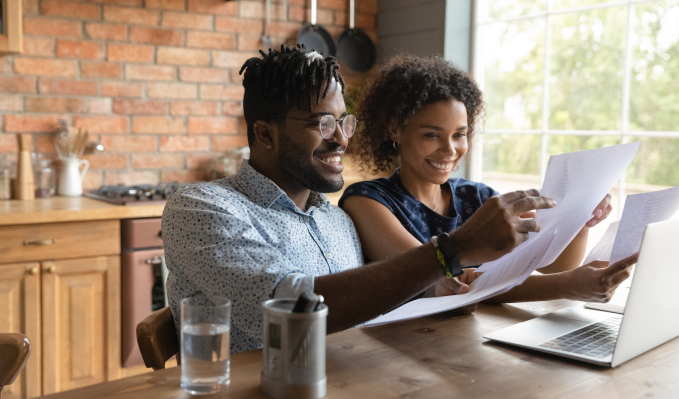 Customers looking through their utilities bills