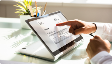 Customer accessing bills through tablet